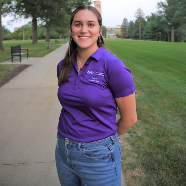 Bailey wearing purple polo