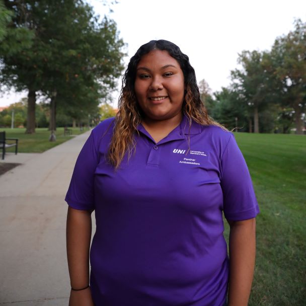 Brenda wearing purple polo