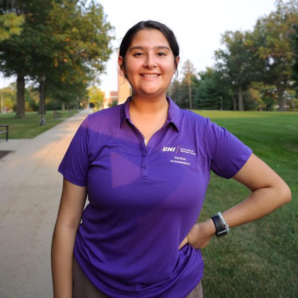 Jocelyn wearing purple polo