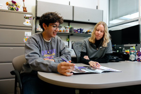 Student meeting with admission counselor