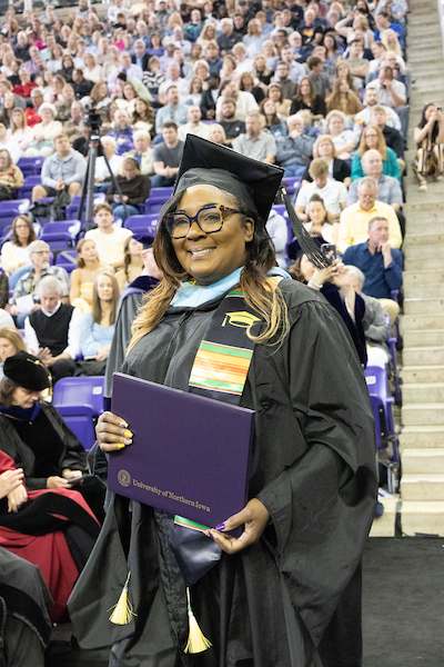 UNI student Sherrita Stokes at a Commencement ceremony.