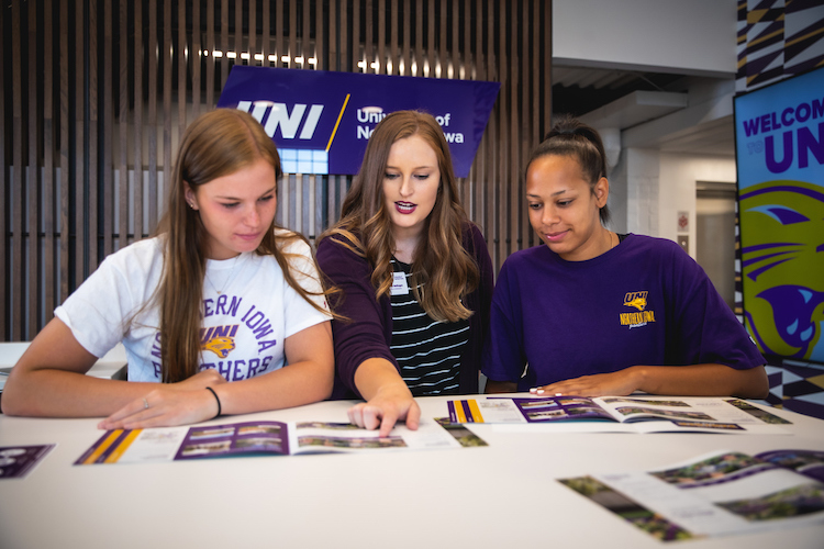 Transfer students with a counselor in the Welcome Center