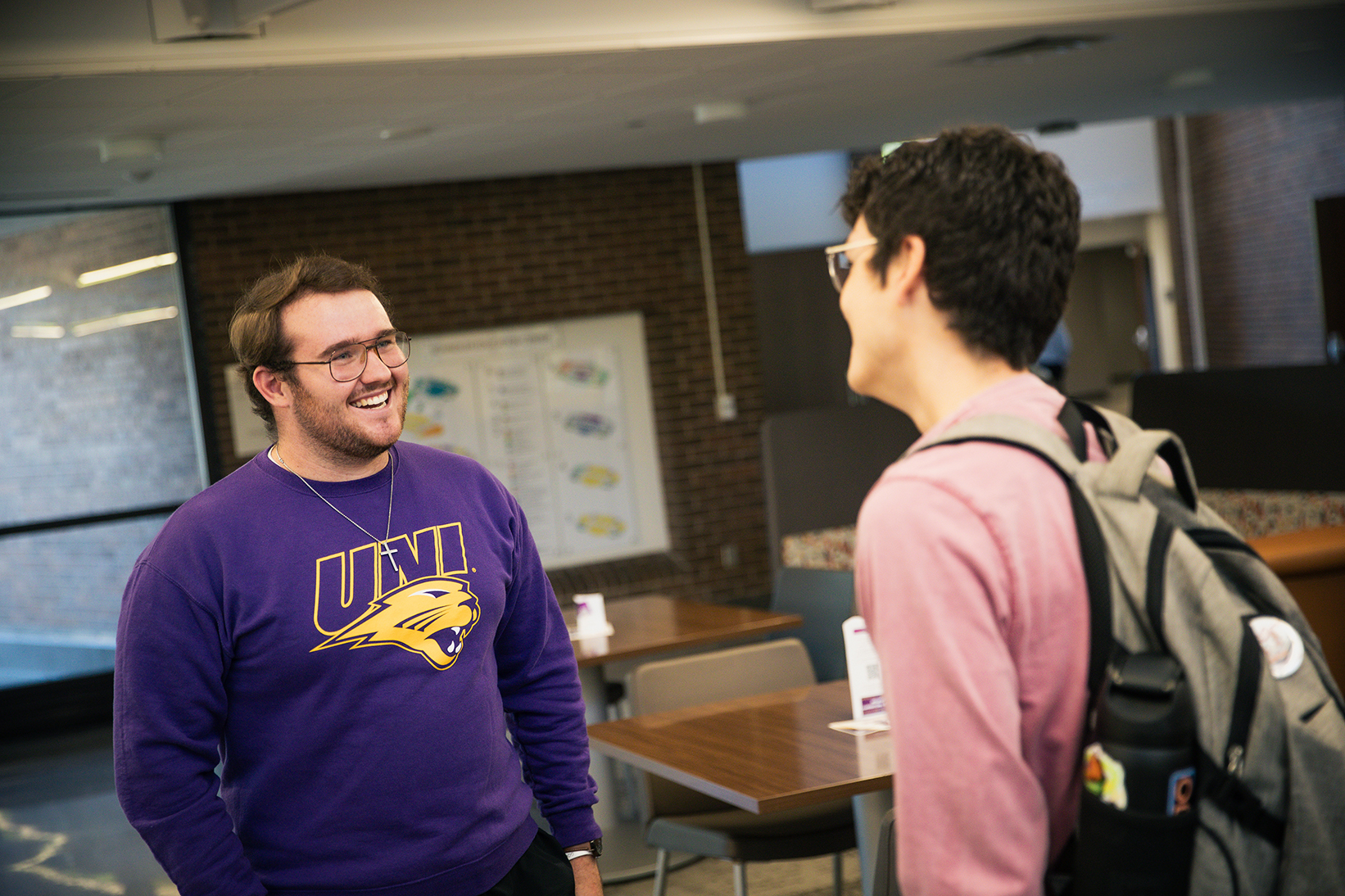 Wyatt talking to another student